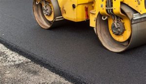 asphalt over concrete driveway