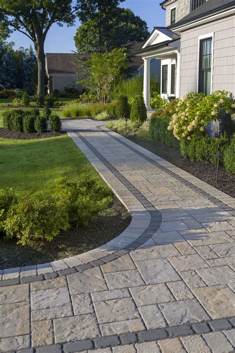 concrete walkway from driveway to front door