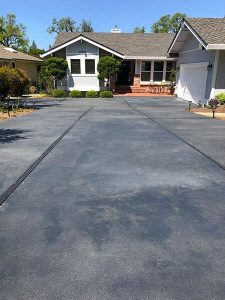 grey stained concrete driveway