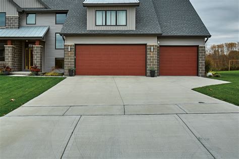 how long before you can drive on new concrete driveway