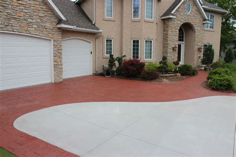 how long to stay off new concrete driveway