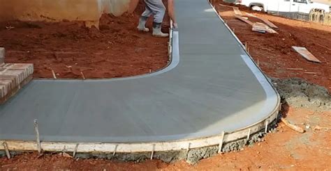 how thick should concrete driveway be