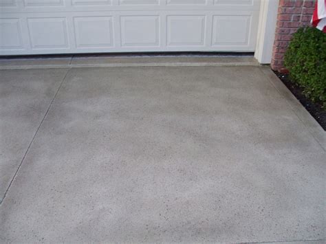 new concrete driveway pitting