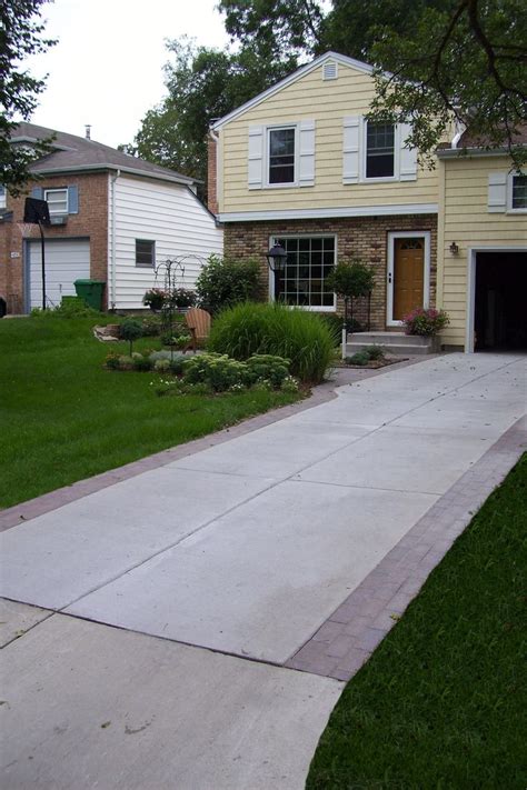 pavers next to concrete driveway